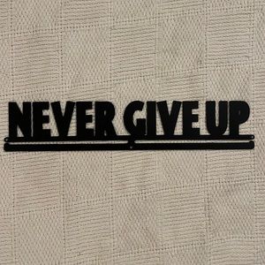 “never give up” medal hanger